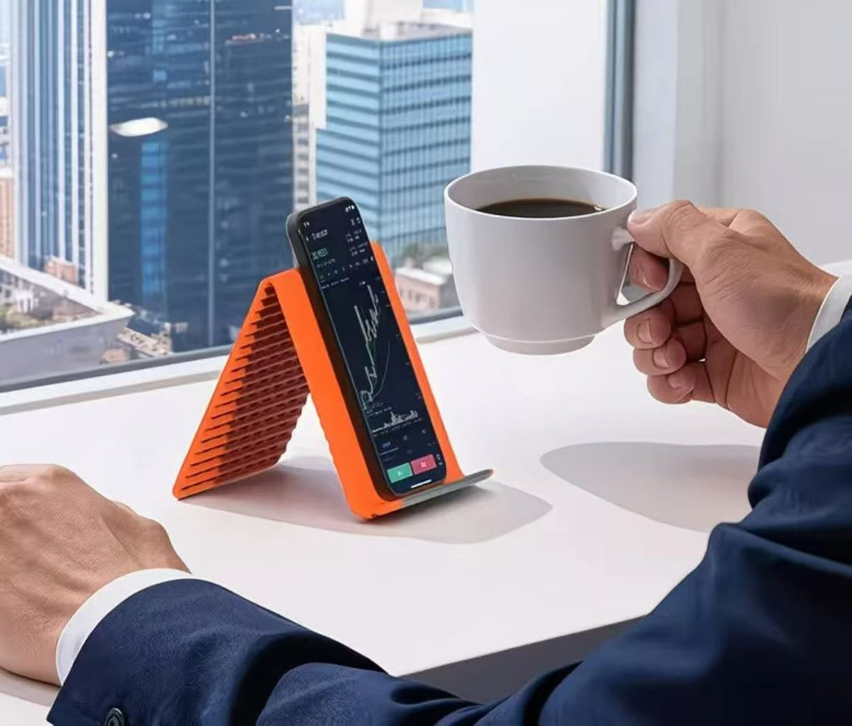 Sammenfoldelig silikone-holder til telefon og laptop