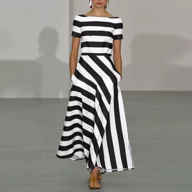 Amanda - Elegant og let kjole med feminine detaljer